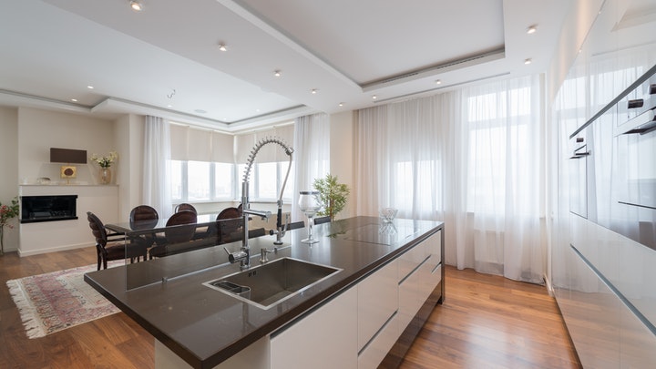 Consejos para decorar la casa y disfrutar plenamente del proceso 4 isla-de-cocina-cerca-del-salon