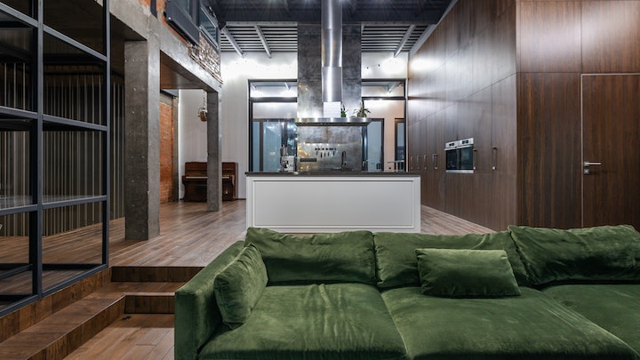 Consejos para incrementar la comodidad en la zona de estar 6 sofa-de-color-verde-en-la-zona-de-estar